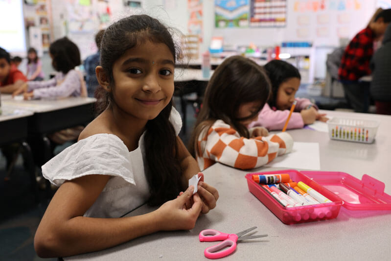 Wild Horse students work on an artistic assignment in class
